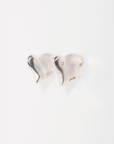 Bitten Heart earring crafted in recycled sterling silver by Carlota Guardia Jewelry