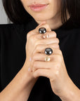 DOUBLE OVAL RING · STERLING SILVER AND GOLD