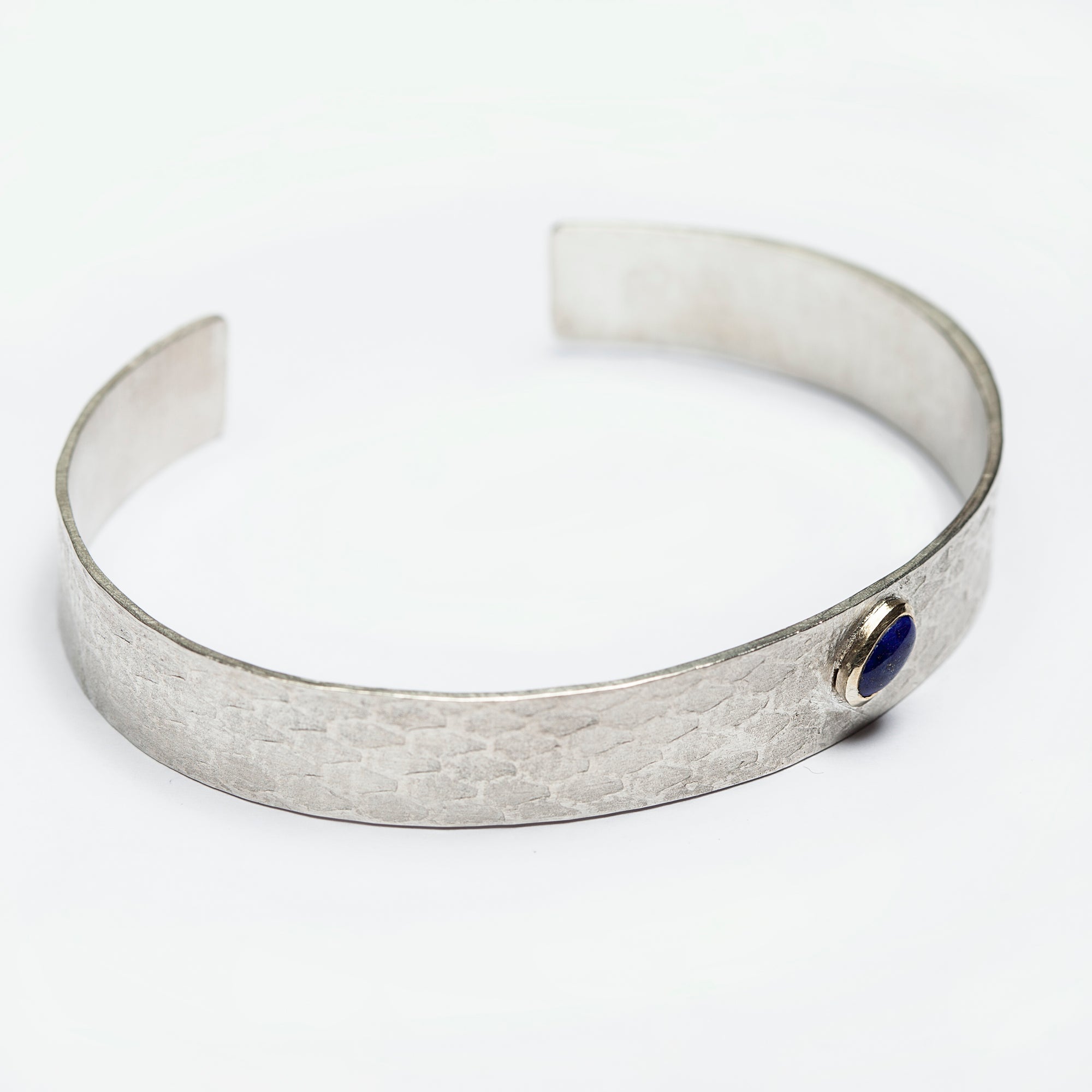 Reptilia Mini silver bracelet with natural gemstone cabochon, front view.