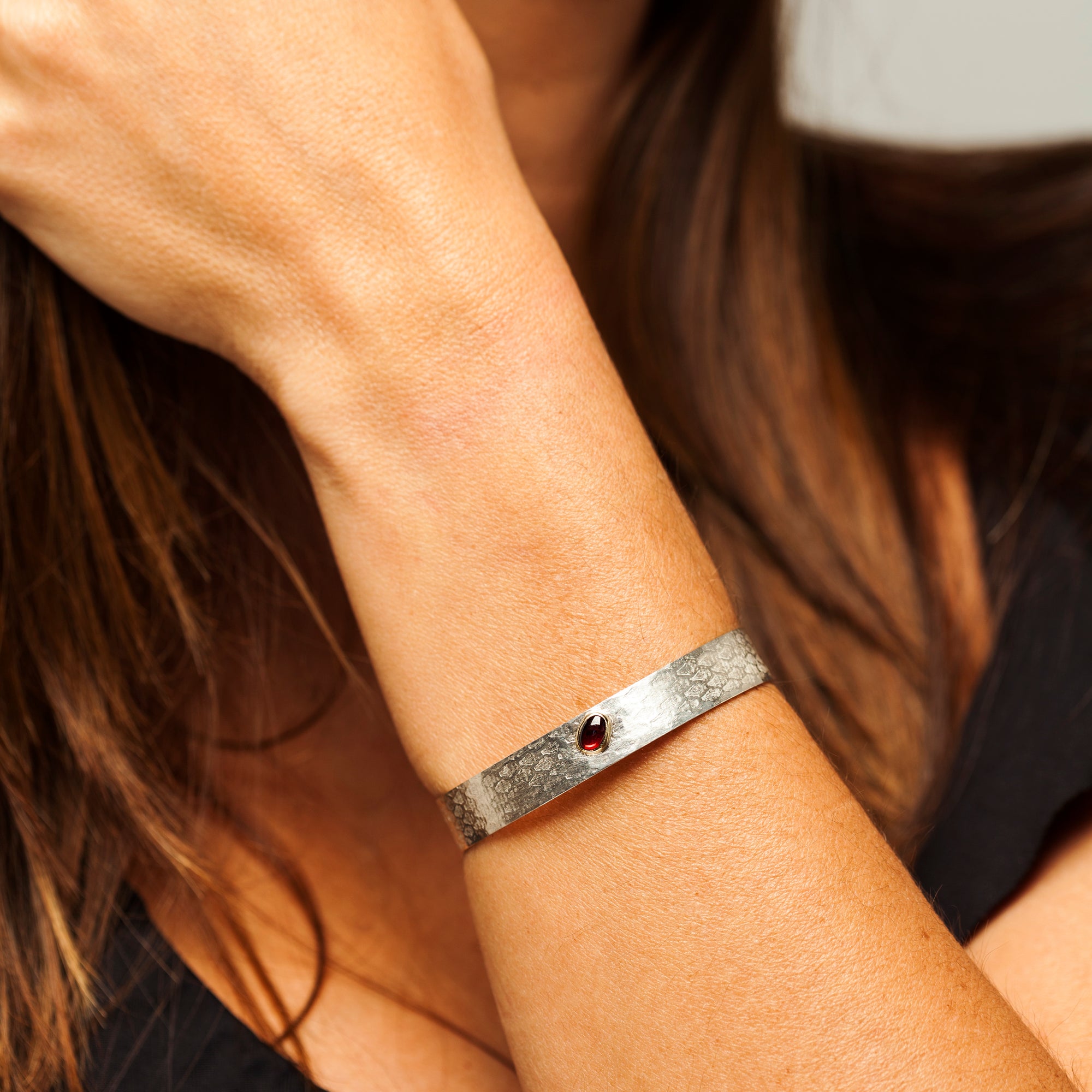 Reptilia Mini silver bracelet with natural gemstone, second on-wrist example.